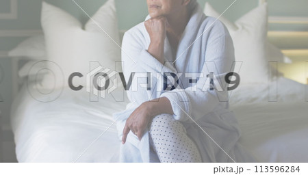 Image of covid 19 text over sad senior woman Image of covid 19 text over sad senior woman 113596284