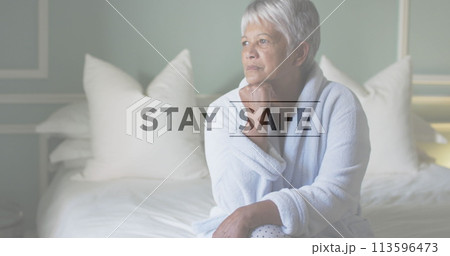 Image of covid 19 text over sad senior woman Image of covid 19 text over sad senior woman 113596473