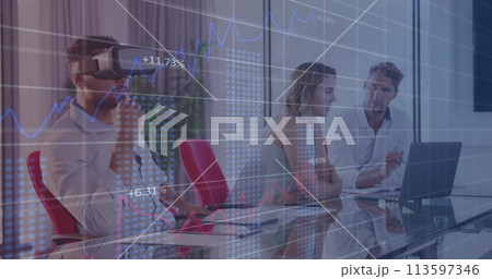 Financial data processing against man wearing vr headset at office 113597346