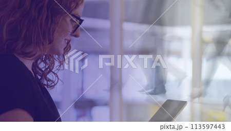 Image of caucasian businesswoman using tablet over data processing and cityscape Image of caucasian businesswoman using tablet over data processing and cityscape 113597443