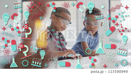 Image of science icons over happy african american schoolboys in chemistry class 113598949