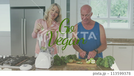 Image of go vegan text over senior caucasian couple cooking Image of go vegan text over senior caucasian couple cooking 113599378