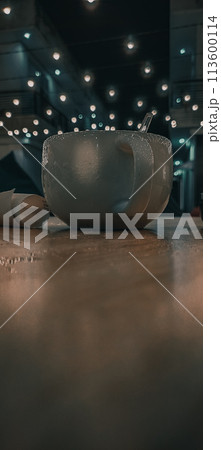 Glass and Cafe Light in city of night 113600114