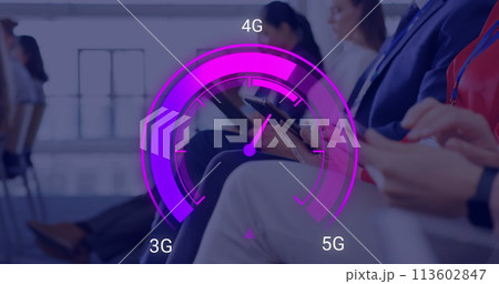 Image of purple speedometer over hands of diverse businesspeople with electronic devices Image of purple speedometer over hands of diverse businesspeople with electronic devices 113602847