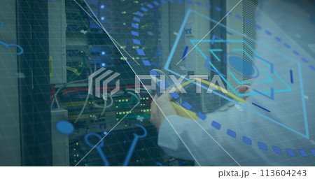 Image of scope scanning over technician checking computer server 113604243