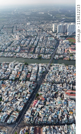 Amazing Aerial view of big Asian city, Ho Chi Minh scene, crowde Amazing Aerial view of big Asian city, Ho Chi Minh scene, crowde 113612213