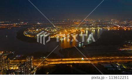 Aerial view from drone of Ho Chi Minh city port with canal system for traffic waterway on Saigon river, crane and container at riverside harbor, logistic for export and import industrial with cheap Aerial view from drone of Ho Chi Minh city port with canal system for traffic waterway on Saigon river, crane and container at riverside harbor, logistic for export and import industrial with cheap 113612251