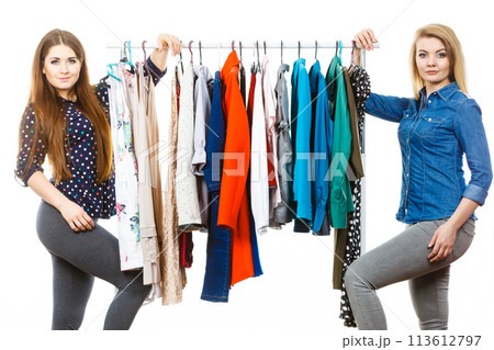 Happy women clothes shopping Happy women clothes shopping 113612797