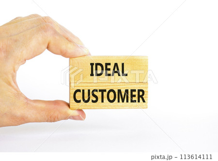 Ideal customer symbol. Concept words Ideal customer on beautiful wooden blocks. Beautiful white table white background. Businessman hand. Business ideal customer concept. Copy space. Ideal customer symbol. Concept words Ideal customer on beautiful wooden blocks. Beautiful white table white background. Businessman hand. Business ideal customer concept. Copy space. 113614111