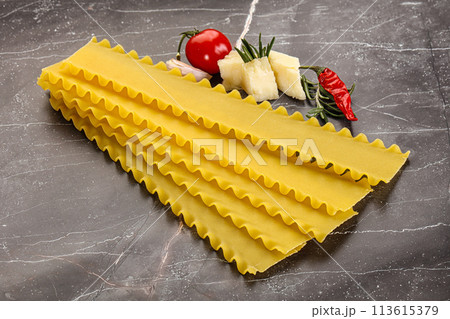 Uncooked raw Lasagna dry sheets Uncooked raw Lasagna dry sheets 113615379