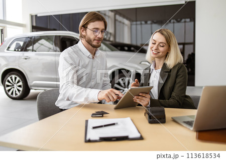 Caucasian rich man customer buyer client in suit sign contract on tablet. 113618534