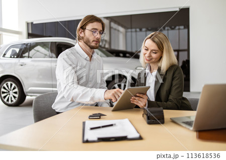 Caucasian rich man customer buyer client in suit sign contract on tablet. 113618536