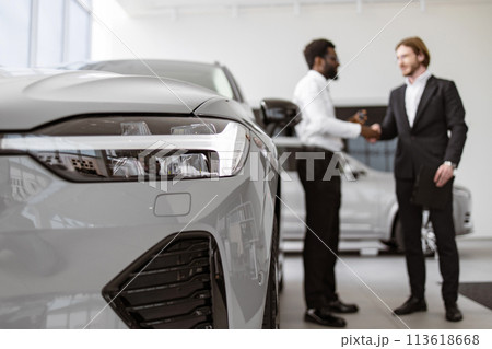 Selective focus on headlight of modern car. 113618668