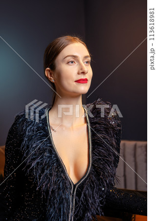 Portrait of gorgeous woman in cocktail dress 113618981