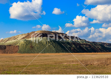 View of slag heaps of iron ore quarry. Mining industry 113620510