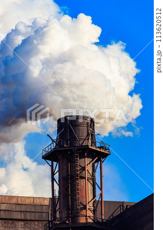 View of old factory with pipe with smoke. Air pollution, environmental damage 113620512