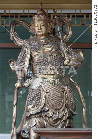 Statue of Sangharama Bodhisattva (Buddhist deity) or The Chinese general Guan Yu. Statue of Sangharama Bodhisattva (Buddhist deity) or The Chinese general Guan Yu. 113620572