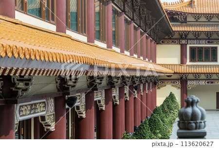 Perspective exterior view of Gable roof and slab of colored tiles at Fo Guang Shan Thaihua Temple. 113620627