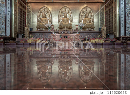 Three Buddha images inside Fo Guang Shan Thaihua Temple. 113620628