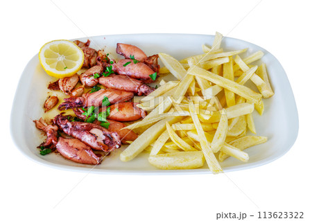 Squid in olive oil and fried potatoes and with lemon is a typical squid dish in the Mediterranean. 113623322