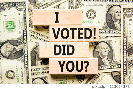 I voted. Did you symbol. Concept words I voted. Did you on beautiful wooden block. Beautiful dollar bills background. Dollar bills. Business I voted. Did you concept. Copy space. 113624378