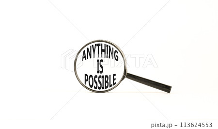 Anything is possible symbol. Concept words Anything is possible in beautiful magnifying glass. Beautiful white table white background. Business anything possible concept. Copy space. 113624553
