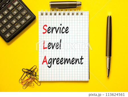 SLA service level agreement symbol. Concept words SLA service level agreement on beautiful white note. Beautiful yellow background. Business SLA service level agreement concept. Copy space. 113624561