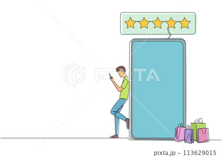 Continuous one line drawing young happy smiling man leaning on giant smartphone while typing on smartphone. Concept of online shop. Review five gold stars. Single line draw design vector illustration 113629015