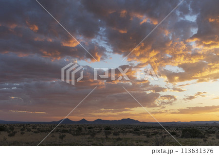 USA, New Mexico, Santa Fe, Dramatic sunset sky above Cerrillos Hills State Park USA, New Mexico, Santa Fe, Dramatic sunset sky above Cerrillos Hills State Park 113631376