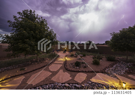 USA, New Mexico, Santa Fe, Storm clouds over garden in High Desert USA, New Mexico, Santa Fe, Storm clouds over garden in High Desert 113631405