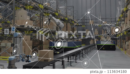 Image of network of conncetions with icons over robotic arms with boxes in warehouse 113634180