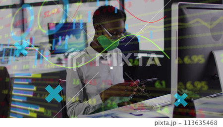 Image of financial data processing over businesswoman with face mask using computer in office Image of financial data processing over businesswoman with face mask using computer in office 113635468