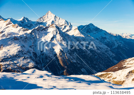 Winter landscape of mountain peaks located near the of Zermatt Winter landscape of mountain peaks located near the of Zermatt 113638495