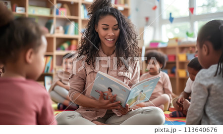 A young teachers sits with a group of children, reading a colorful book. The concept of the joy of learning and the role of teachers in inspiring young minds. Generative AI. 113640676