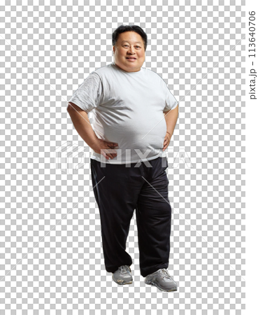 Full-length portrait of an overweight man with his hands on his hips 113640706