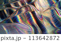Abstract 3d rendered background depicting a holographic spectrum of light on a textured, wave-patterned surface, showcasing a range of colors. 113642872