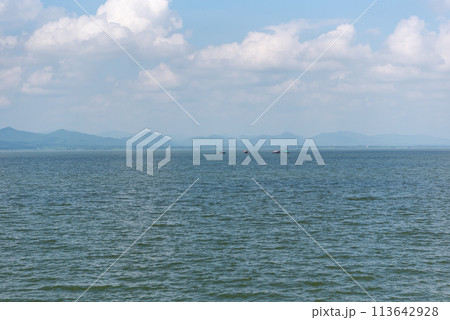 Beach and sea with blue sky Beach and sea with blue sky 113642928