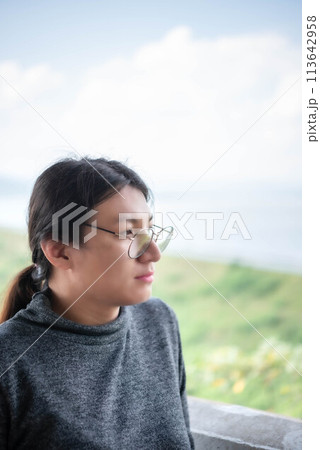 Woman (LGBTQ) posing at sea viewpoint with happy Woman (LGBTQ) posing at sea viewpoint with happy 113642958