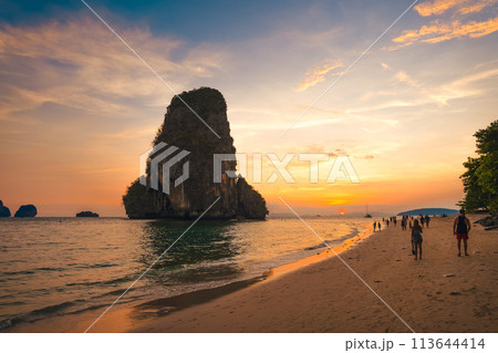 Sunset view of the sea and rocky mountains at Railay Beach,Travel summer Sunset view of the sea and rocky mountains at Railay Beach,Travel summer 113644414