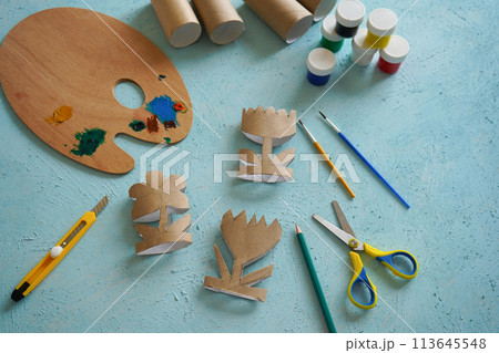 Kids craft flowers out of recycling toilet paper roll, zero waste concept. Step by step tutorial - 3. Kids craft flowers out of recycling toilet paper roll, zero waste concept. Step by step tutorial - 3. 113645548