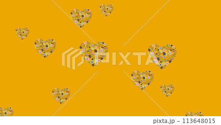 Image of flower hearts moving in hypnotic motion with copy space on orange background 113648015