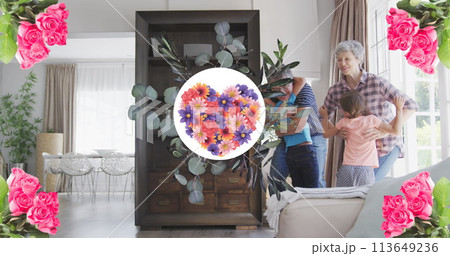 Image of flower heart in round shape over happy caucasian grandparents and granddaughter Image of flower heart in round shape over happy caucasian grandparents and granddaughter 113649236