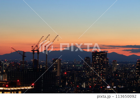 Sunset behind Mt. Fuji as seen from Minato-ku in central Tokyo Japan 113650092