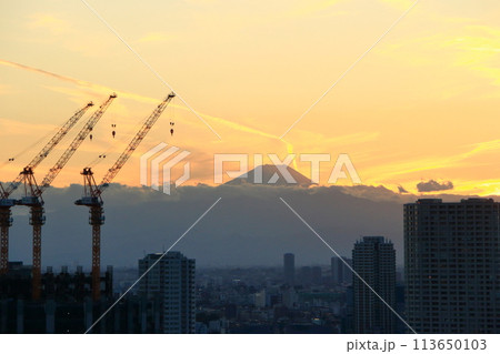 Sunset behind Mt. Fuji as seen from Minato-ku in central Tokyo Japan 113650103