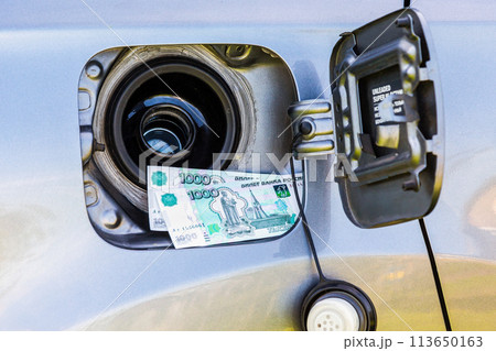 Russian roubles banknotes in the gas tank of a vehicle Russian roubles banknotes in the gas tank of a vehicle 113650163