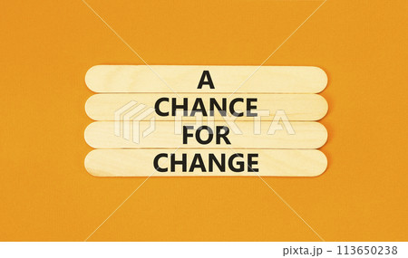 A chance for change symbol. Concept words A chance for change on wooden stick. Beautiful orange table orange background. Business A chance for change concept. Copy space. A chance for change symbol. Concept words A chance for change on wooden stick. Beautiful orange table orange background. Business A chance for change concept. Copy space. 113650238
