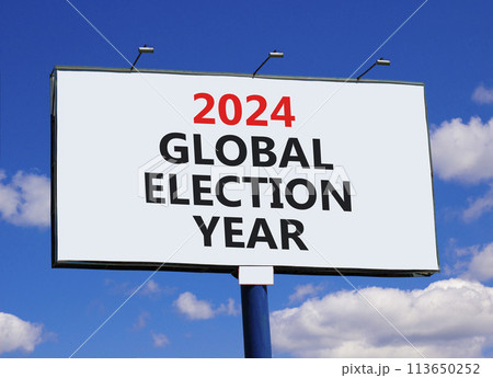 2024 global election year symbol. Concept words 2024 global election year on beautiful big white billboard. Beautiful blue sky cloud background. Business 2024 global election year concept. Copy space 113650252