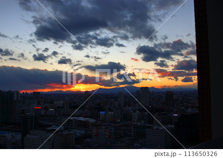 Sunset behind Mt. Fuji as seen from Minato-ku in central Tokyo Japan Sunset behind Mt. Fuji as seen from Minato-ku in central Tokyo Japan 113650326