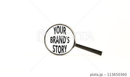 Branding and your brand story symbol. Concept words Your brands story in beautiful magnifying glass. Beautiful white table white background. Business branding your brand story concept. Copy space. 113650360