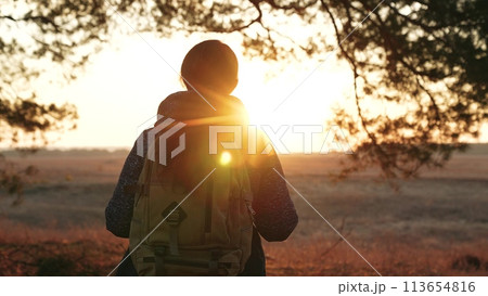 young woman hiking, woman backpack sunset, female traveler relaxation, hiker pine forest, adventure woman weekend, solo traveler dream, happy hiker nature, young backpacker pine, outdoor sunset walk 113654816